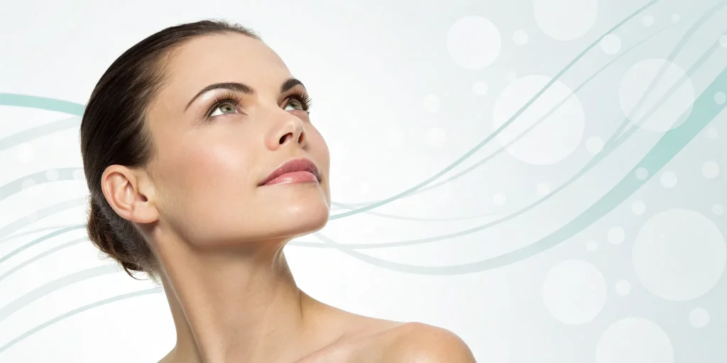 Woman with smooth, youthful skin enjoying the results of a non-invasive facelift.